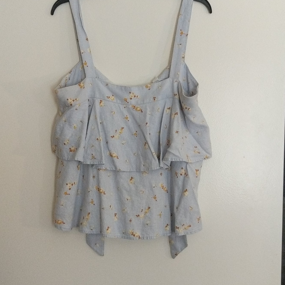 Sleeveless blue with yellow flowers blouse